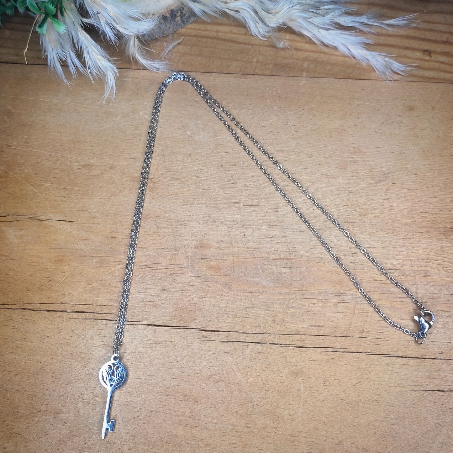 Collier "La Clé du Bonheur" – Élégance & Spiritualité